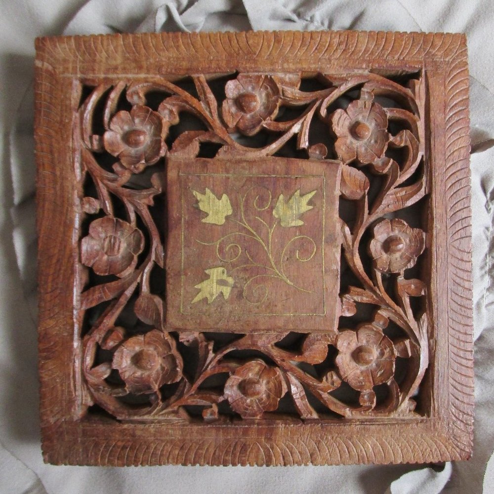carved wood footed trivet